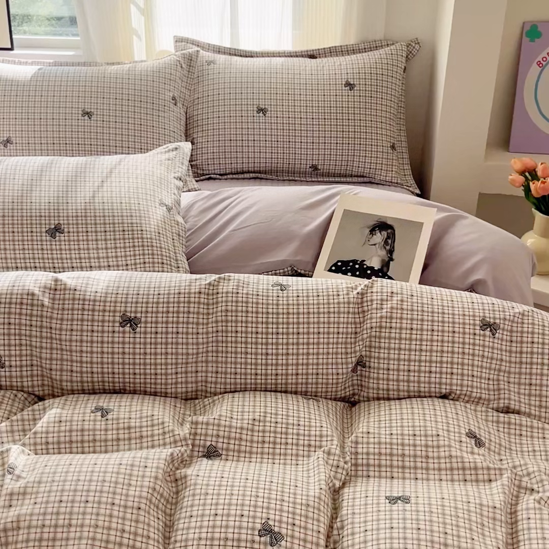 91家纺网 家纺一手货源 找家纺 尚美 2026新款简约印花床盖四件套 格子蝴蝶结