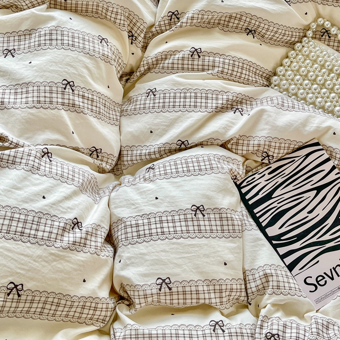 91家纺网 家纺一手货源 找家纺 尚美 2026新款简约印花床盖四件套 奶茶格蝶