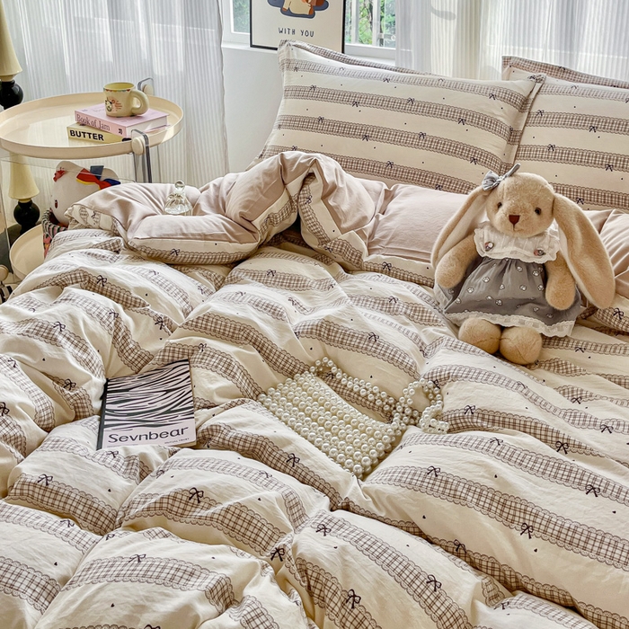 91家纺网 家纺一手货源 找家纺 尚美 2026新款简约印花床盖四件套 奶茶格蝶