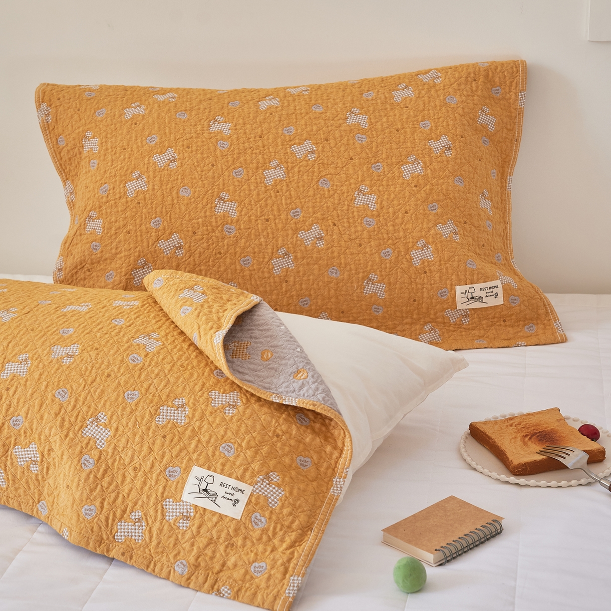 91家纺网 家纺一手货源 找家纺 沐瑟家纺 2026新款安心棉枕巾 爱心狗-桔