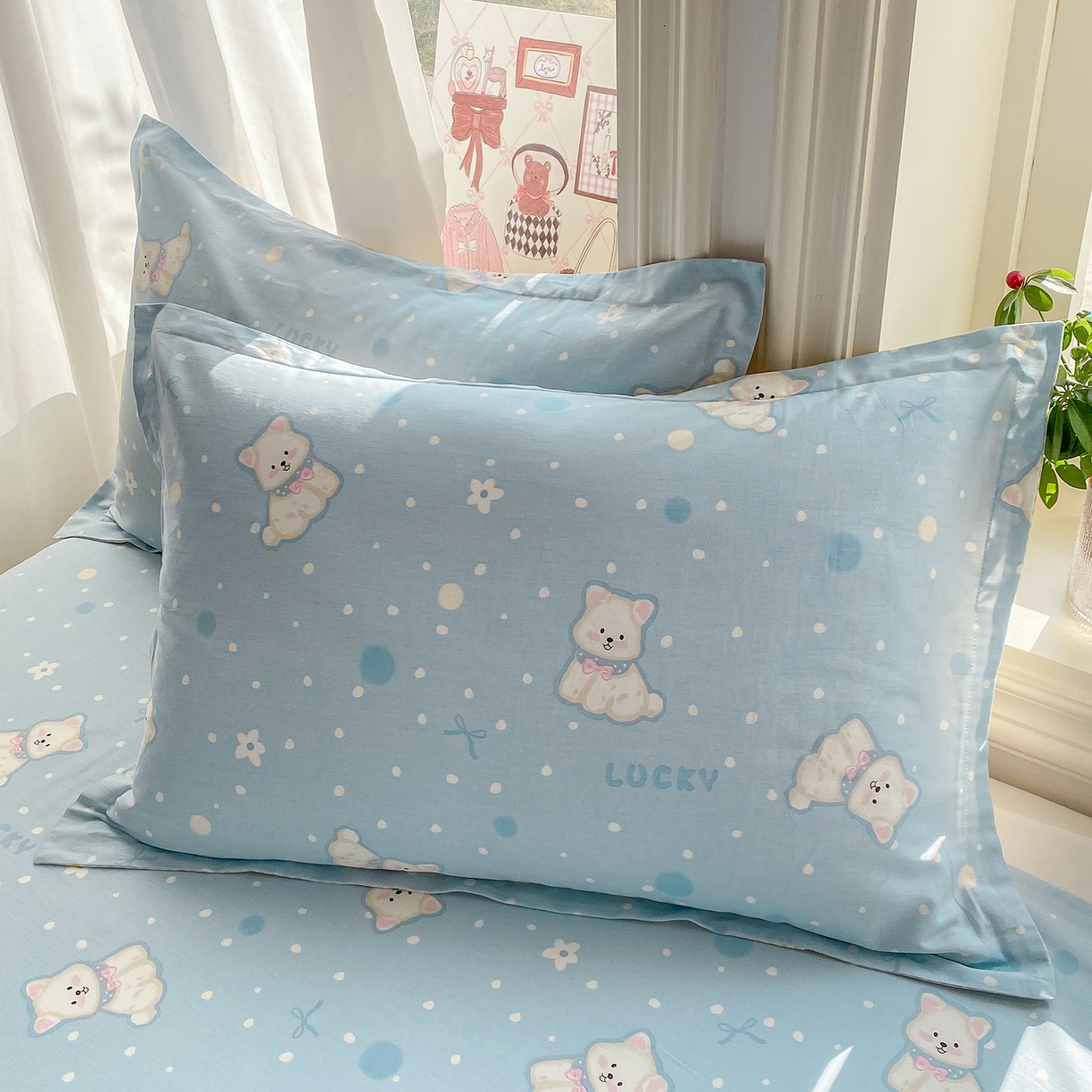 91家纺网 家纺一手货源 找家纺 花梦欣 2026新款全棉印花单品系列3简约卡通款-单枕套 蓝色泡芙狗