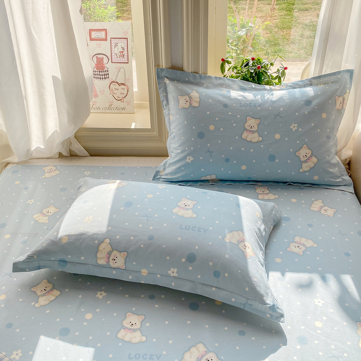 91家纺网 家纺一手货源 找家纺 花梦欣 2026新款全棉印花单品系列3简约卡通款-单枕套 蓝色泡芙狗