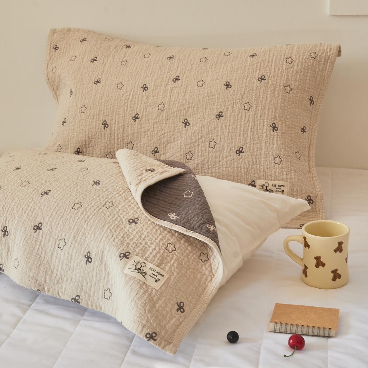 91家纺网 家纺一手货源 找家纺 沐瑟家纺 2026新款安心棉枕巾 蝴蝶结五角星-浅咖