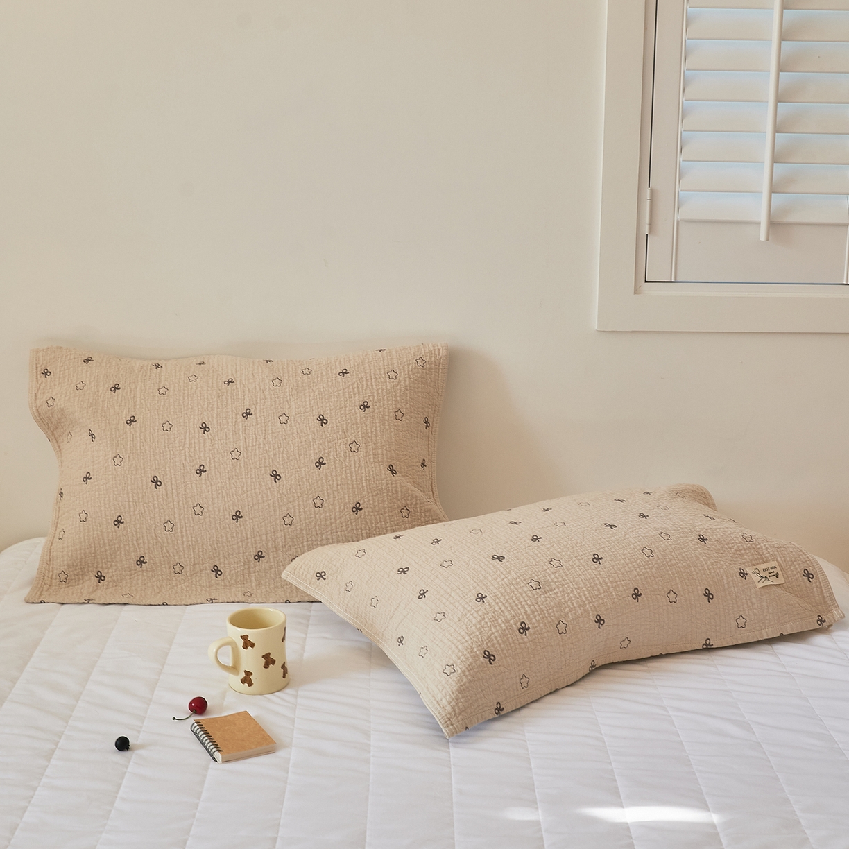 91家纺网 家纺一手货源 找家纺 沐瑟家纺 2026新款安心棉枕巾 蝴蝶结五角星-浅咖