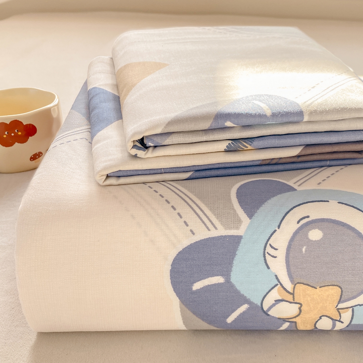 91家纺网 家纺一手货源 找家纺 花梦欣 2026新款全棉印花单品系列3简约卡通款-单床单 几何飞船