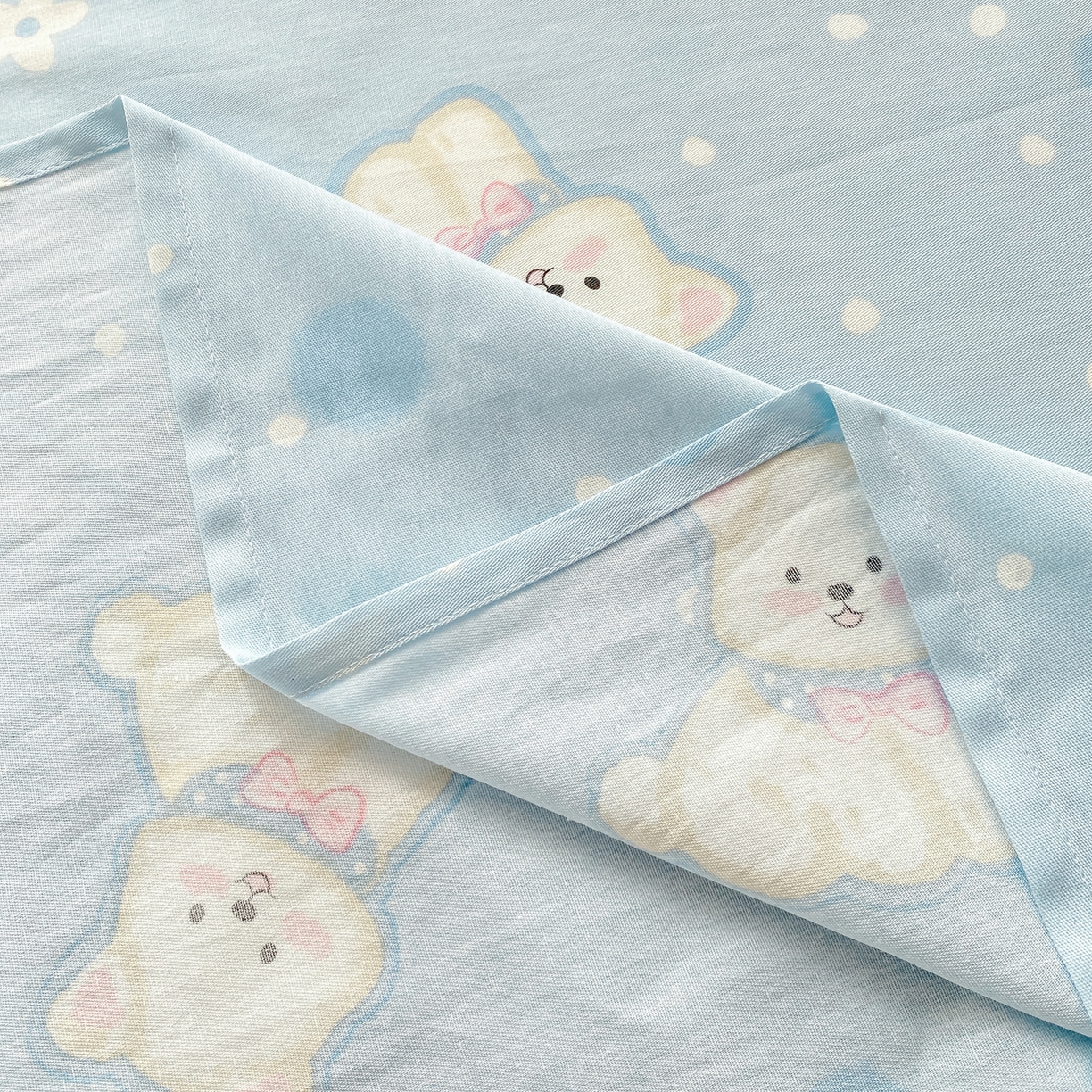 91家纺网 家纺一手货源 找家纺 花梦欣 2026新款全棉印花单品系列3简约卡通款-单床单 蓝色泡芙狗