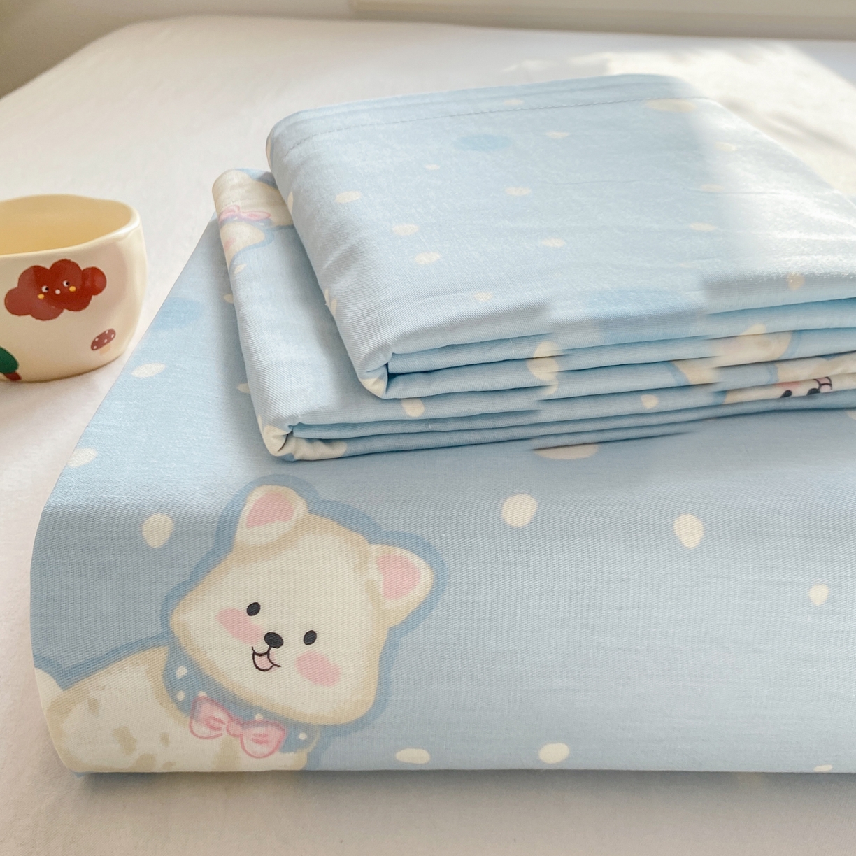 91家纺网 家纺一手货源 找家纺 花梦欣 2026新款全棉印花单品系列3简约卡通款-单床单 蓝色泡芙狗
