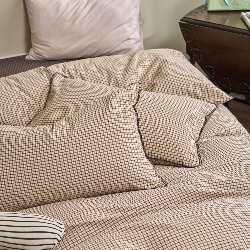 91家纺网 家纺一手货源 找家纺 洋铭区（原狠狠爱） 2026新款色织水洗棉一字边四件套系列 杏仁米格