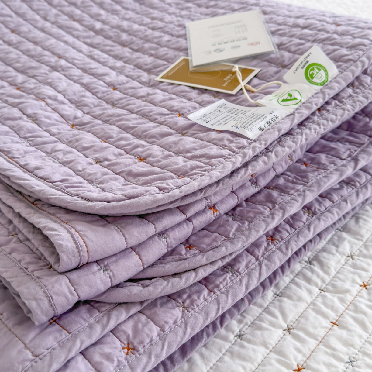 91家纺网 家纺一手货源 找家纺 沐纯家居 2026新款60支全棉纯棉米粒绣纯色床盖三件套 紫色