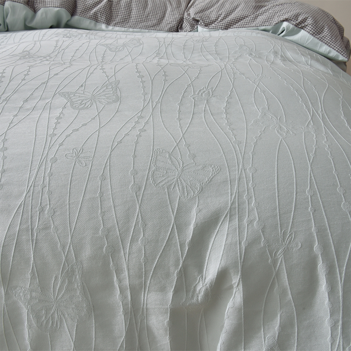 91家纺网 家纺一手货源 找家纺 炫拼家纺 2026新款A类60支水洗棉立体浮雕提花全棉四件套-幻蝶系列 幻蝶-奶绿