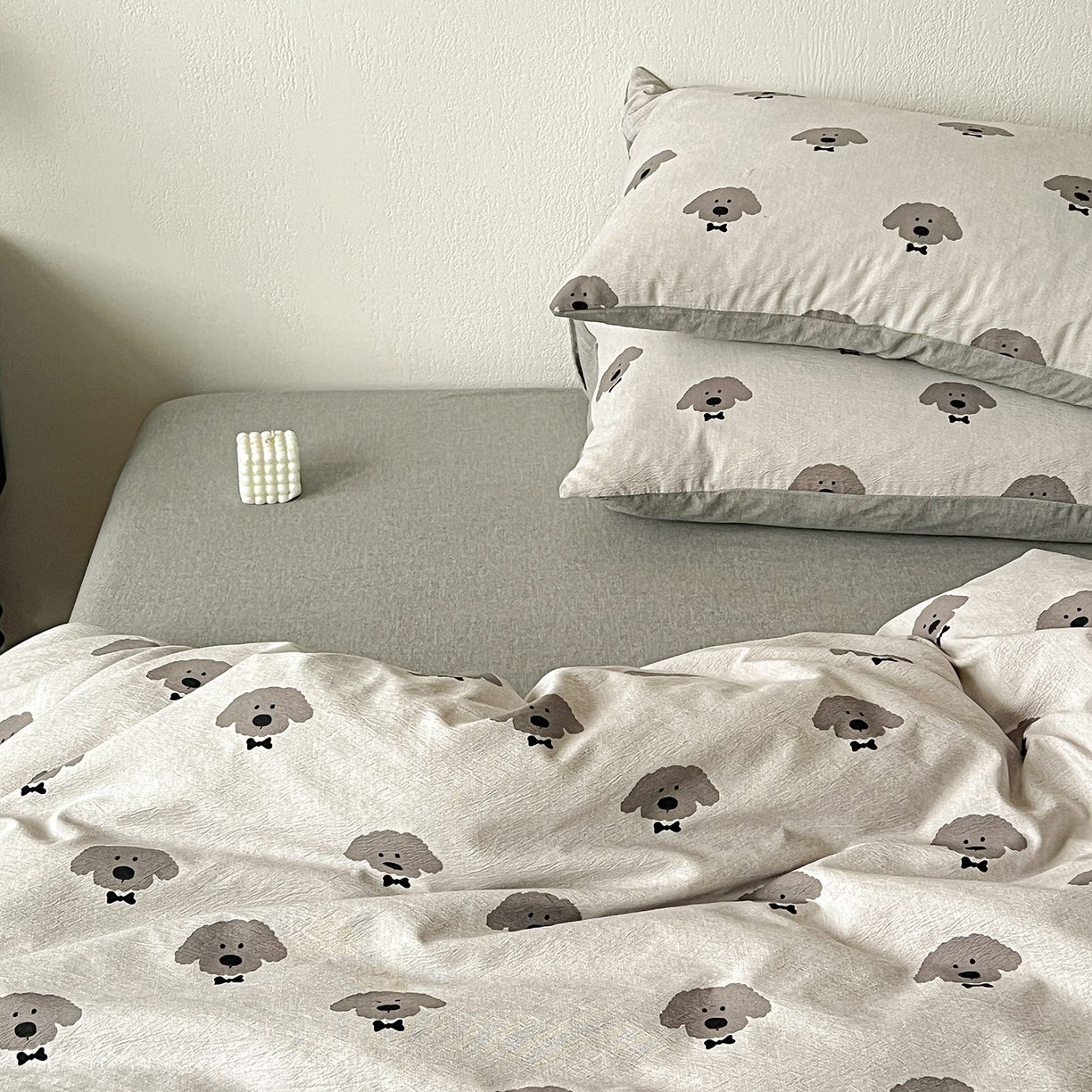 91家纺网 家纺一手货源 找家纺 仟网汇 2026新款高克重加厚色织提花系列四件套小布袋包装 萌萌狗