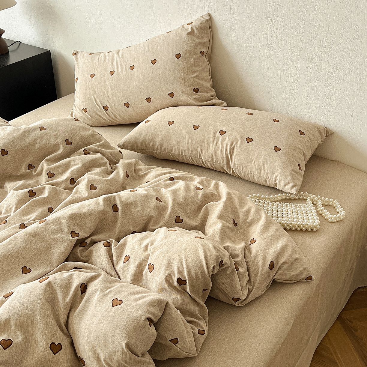 91家纺网 家纺一手货源 找家纺 仟网汇 2026新款高克重加厚色织提花系列四件套小布袋包装 甜心咖