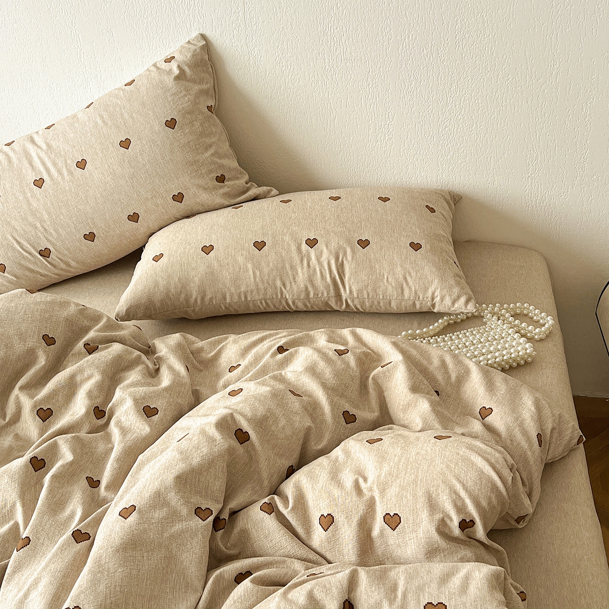 91家纺网 家纺一手货源 找家纺 仟网汇 2026新款高克重加厚色织提花系列四件套小布袋包装 甜心咖