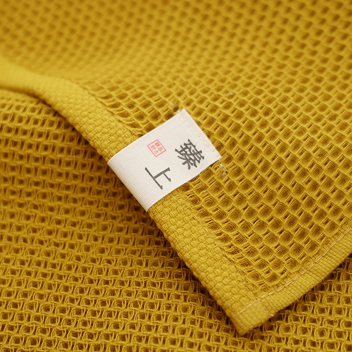 91家纺网 家纺一手货源 找家纺 朴尔家纺-毛巾被 2026新款北欧风素色布标全棉蜂窝华夫格透气枕巾 北欧风-芥末黄