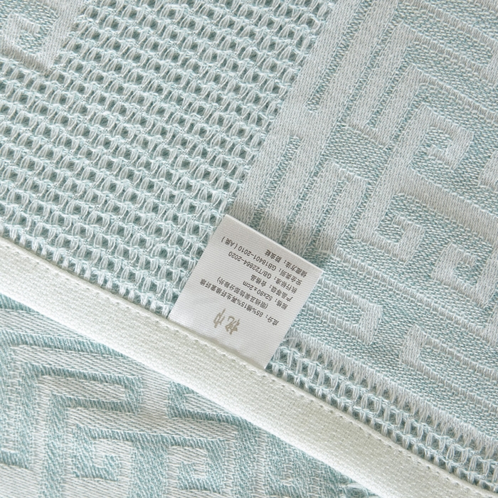 91家纺网 家纺一手货源 找家纺 朴尔家纺-毛巾被 2026新款全棉纱布蜂窝结构系列枕巾系列 魔方印-水绿