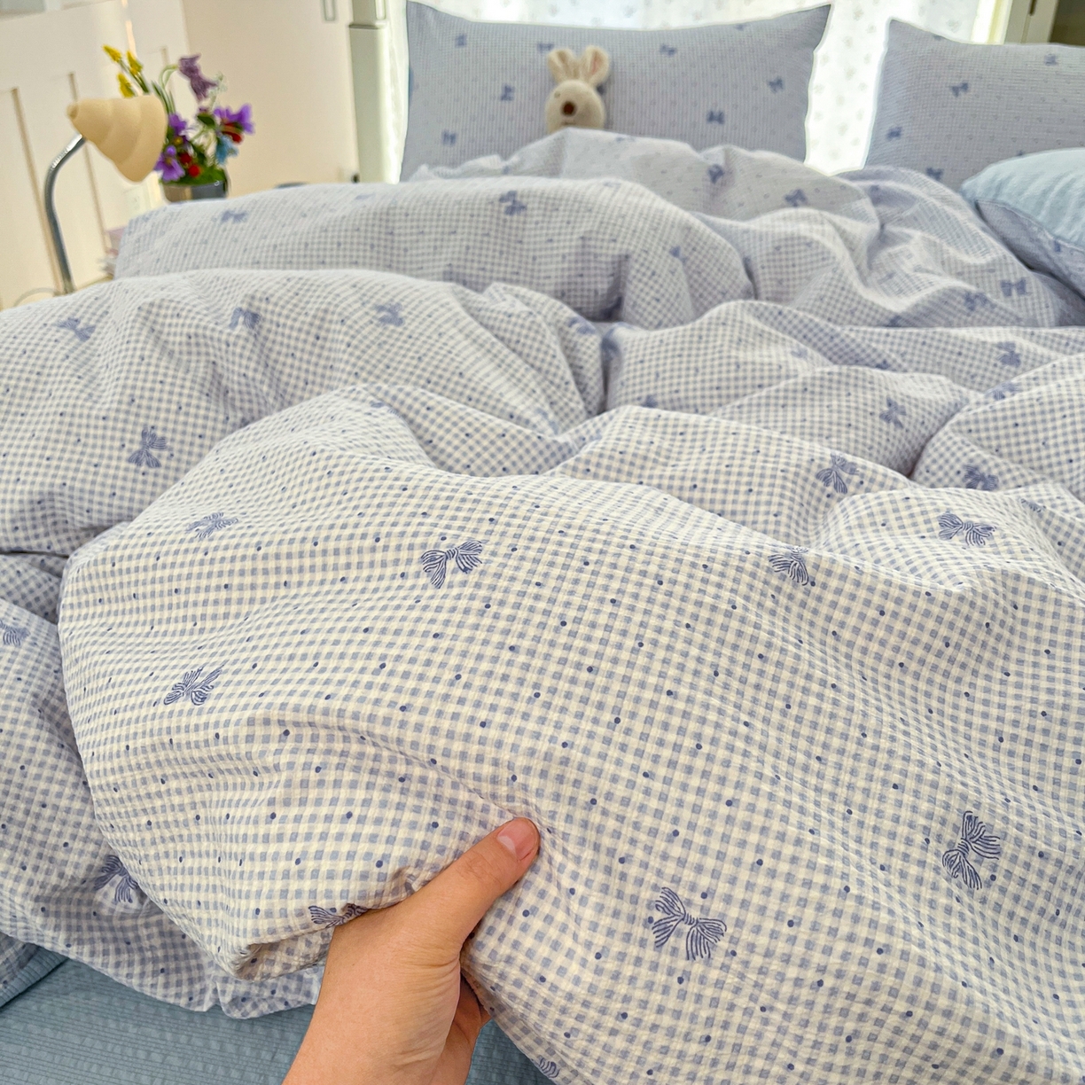 91家纺网 家纺一手货源 找家纺 玉海棠家纺 2026新款直播爆款高品质高克重泡泡纱泡芙纱四件套 蝴蝶结蓝格