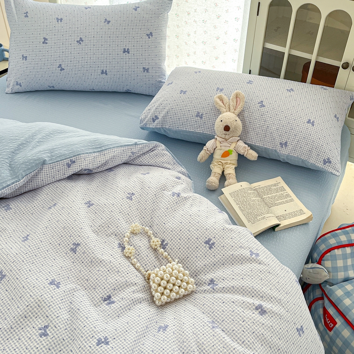 91家纺网 家纺一手货源 找家纺 玉海棠家纺 2026新款直播爆款高品质高克重泡泡纱泡芙纱四件套 蝴蝶结蓝格