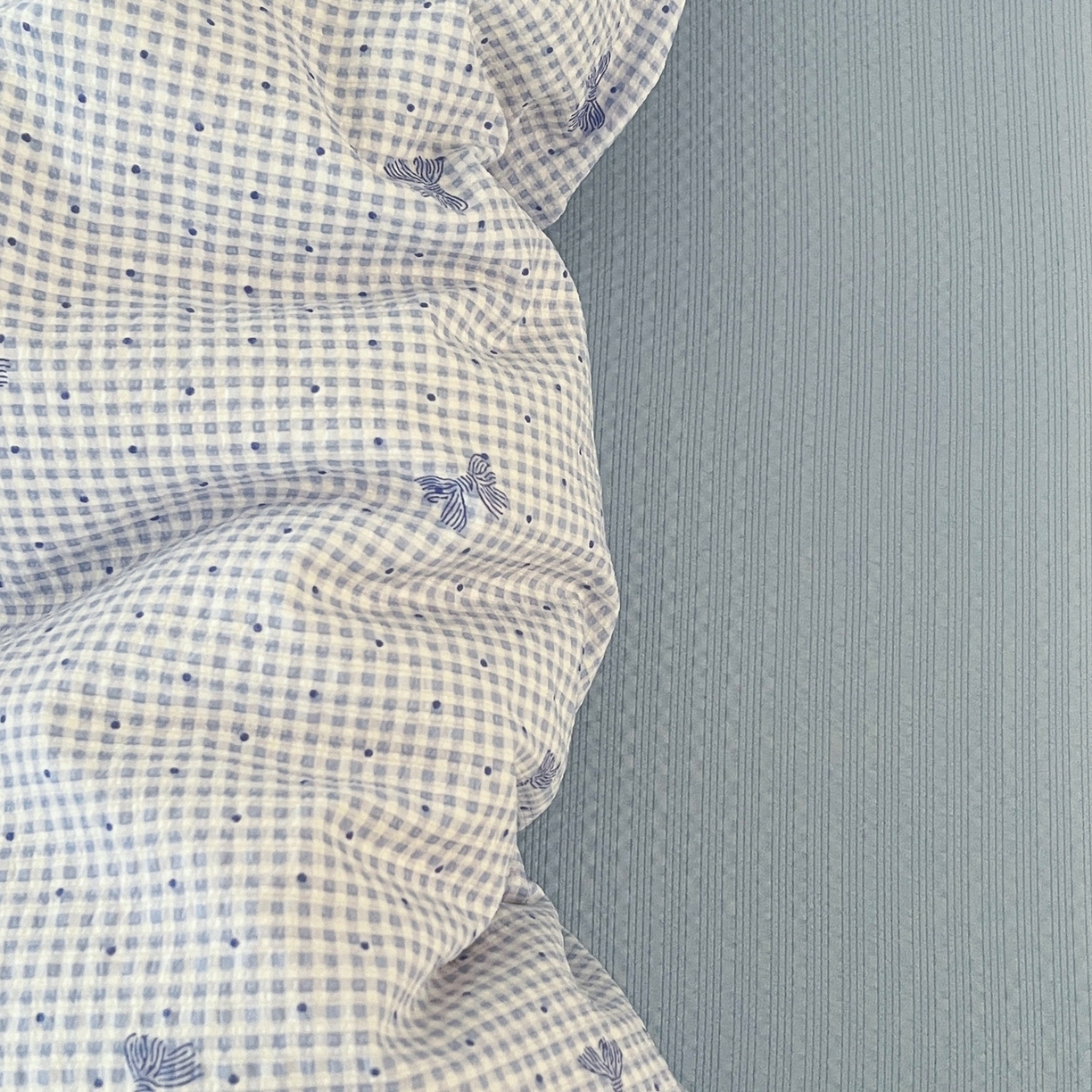 91家纺网 家纺一手货源 找家纺 玉海棠家纺 2026新款直播爆款高品质高克重泡泡纱泡芙纱四件套 蝴蝶结蓝格