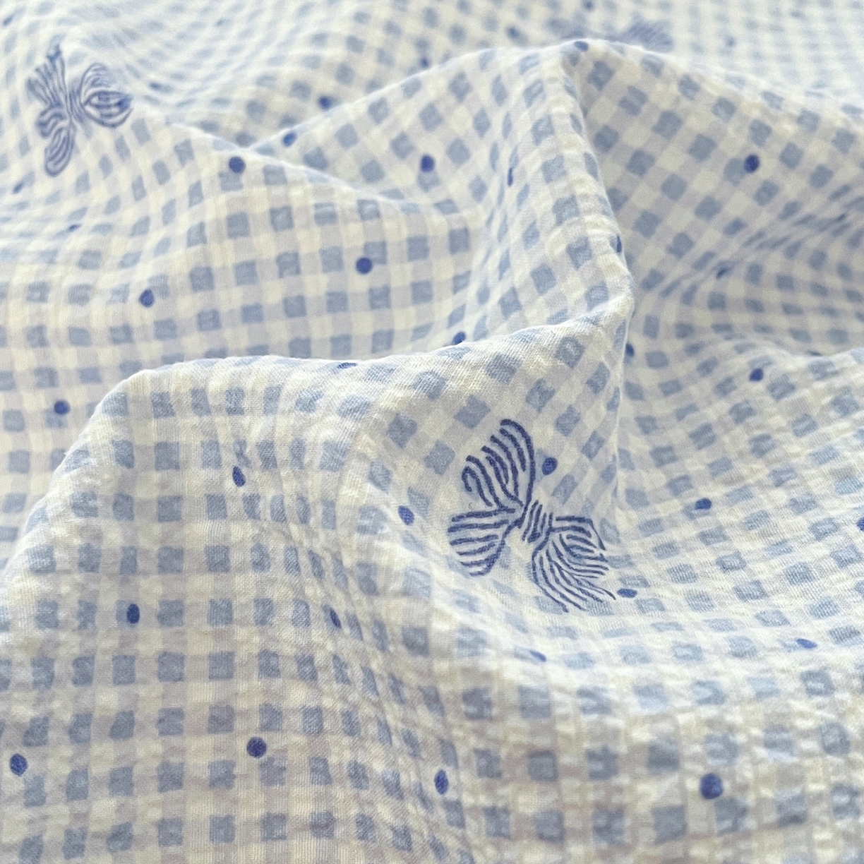 91家纺网 家纺一手货源 找家纺 玉海棠家纺 2026新款直播爆款高品质高克重泡泡纱泡芙纱四件套 蝴蝶结蓝格