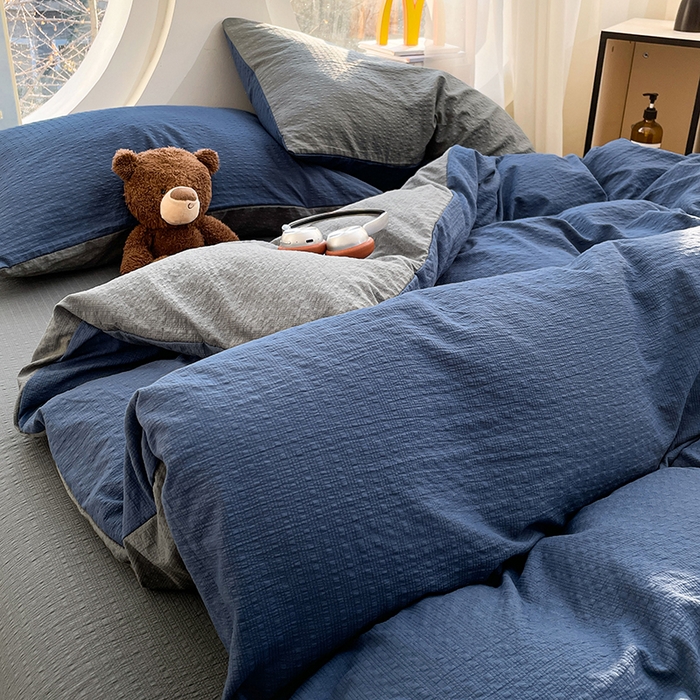 91家纺网 家纺一手货源 找家纺 优承佳生活馆 2026新款软糯双拼泡芙纱四件套 星空蓝+银优灰