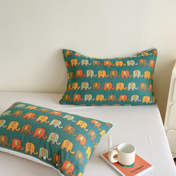 91家纺网 家纺一手货源 找家纺 朴尔家纺-毛巾被 2026新款半包可调节暗扣魔术全棉纯棉三层纱布枕巾 多彩小象-绿黄 53x110cm枕巾一对