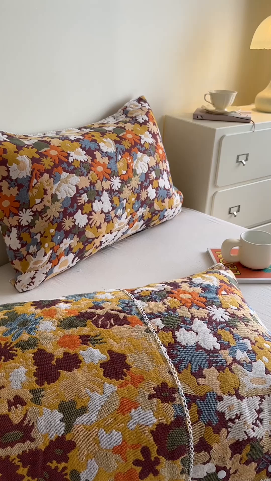 91家纺网 家纺一手货源 找家纺 朴尔家纺-毛巾被 2026新款半包可调节暗扣魔术全棉纯棉三层纱布枕巾 多彩小象-米白 53x110cm枕巾一对