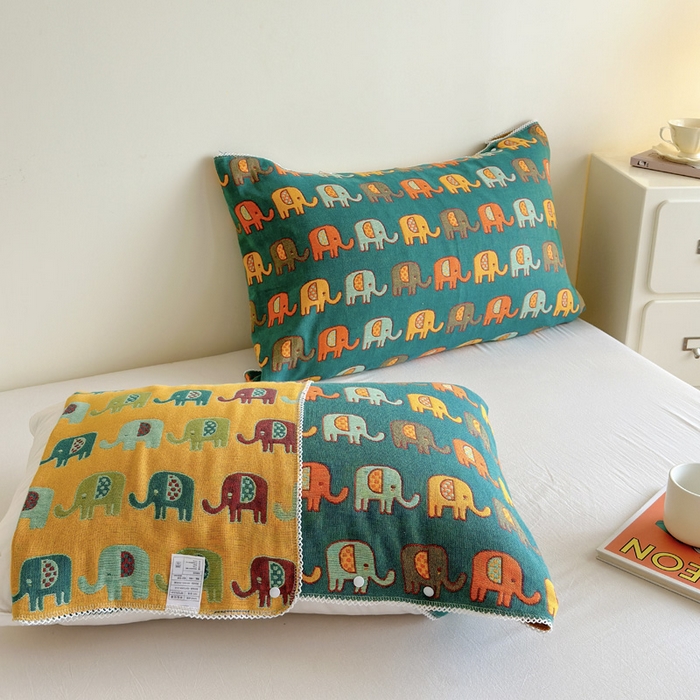 91家纺网 家纺一手货源 找家纺 朴尔家纺-毛巾被 2026新款半包可调节暗扣魔术全棉纯棉三层纱布枕巾 多彩小象-绿黄 53x110cm枕巾一对