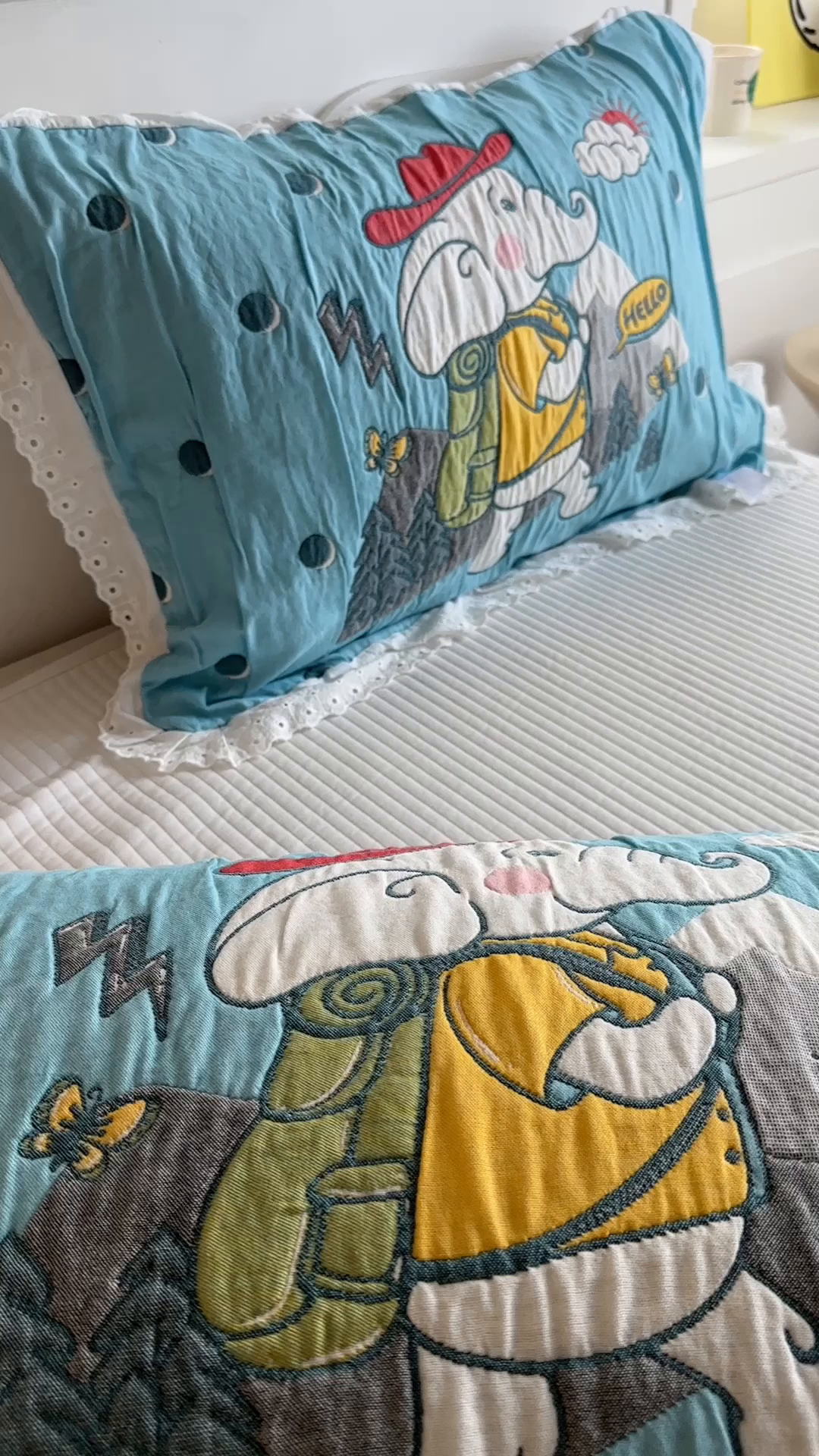 91家纺网 家纺一手货源 找家纺 朴尔家纺-毛巾被 2026新款韩版花边卡通水洗起皱纯棉六层纱布枕巾 徒步小象