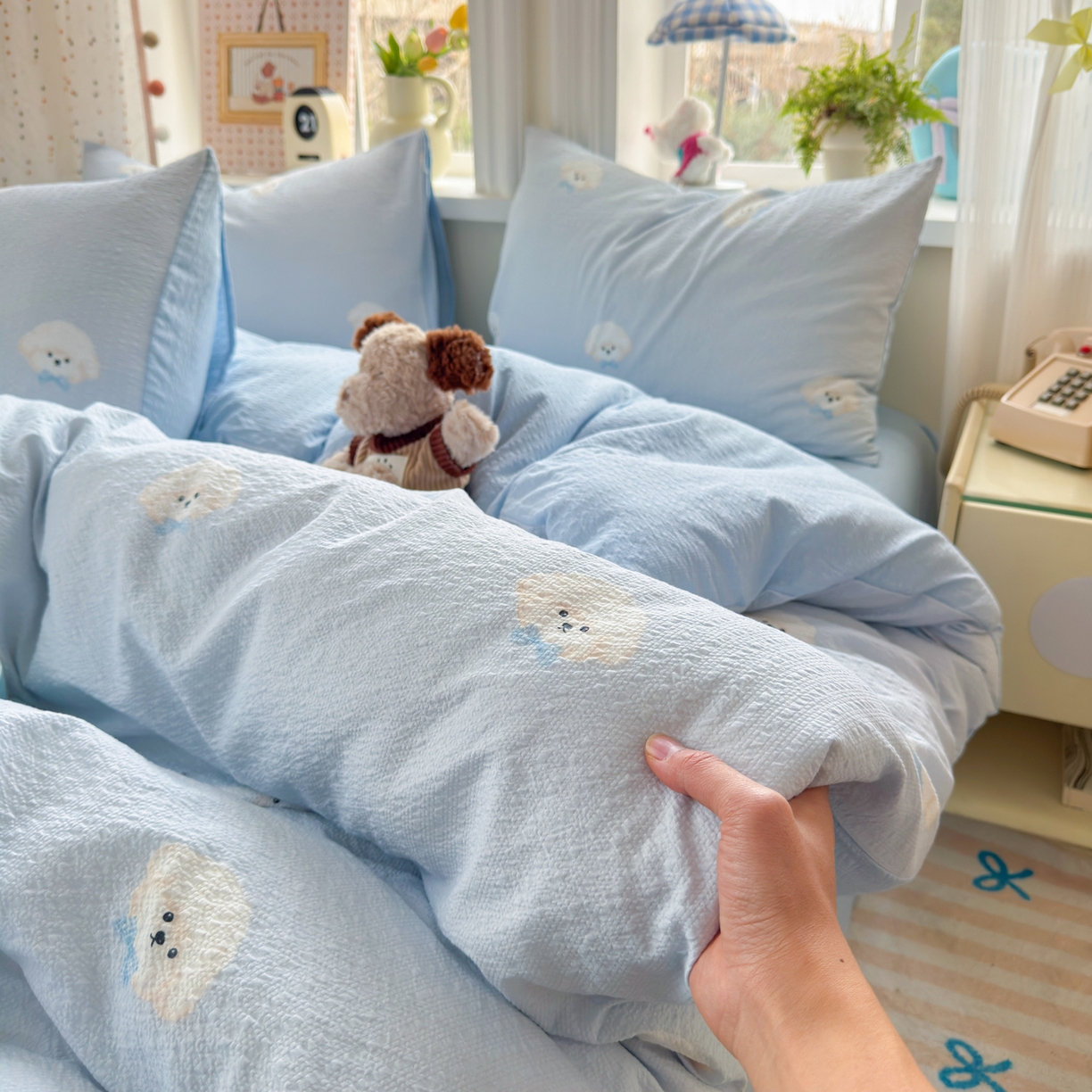 91家纺网 家纺一手货源 找家纺 优承佳生活馆 2026年新款卡通小清新风格高克重超柔软糯泡芙双层纱面料三件套四件套单被套系列 萌萌狗