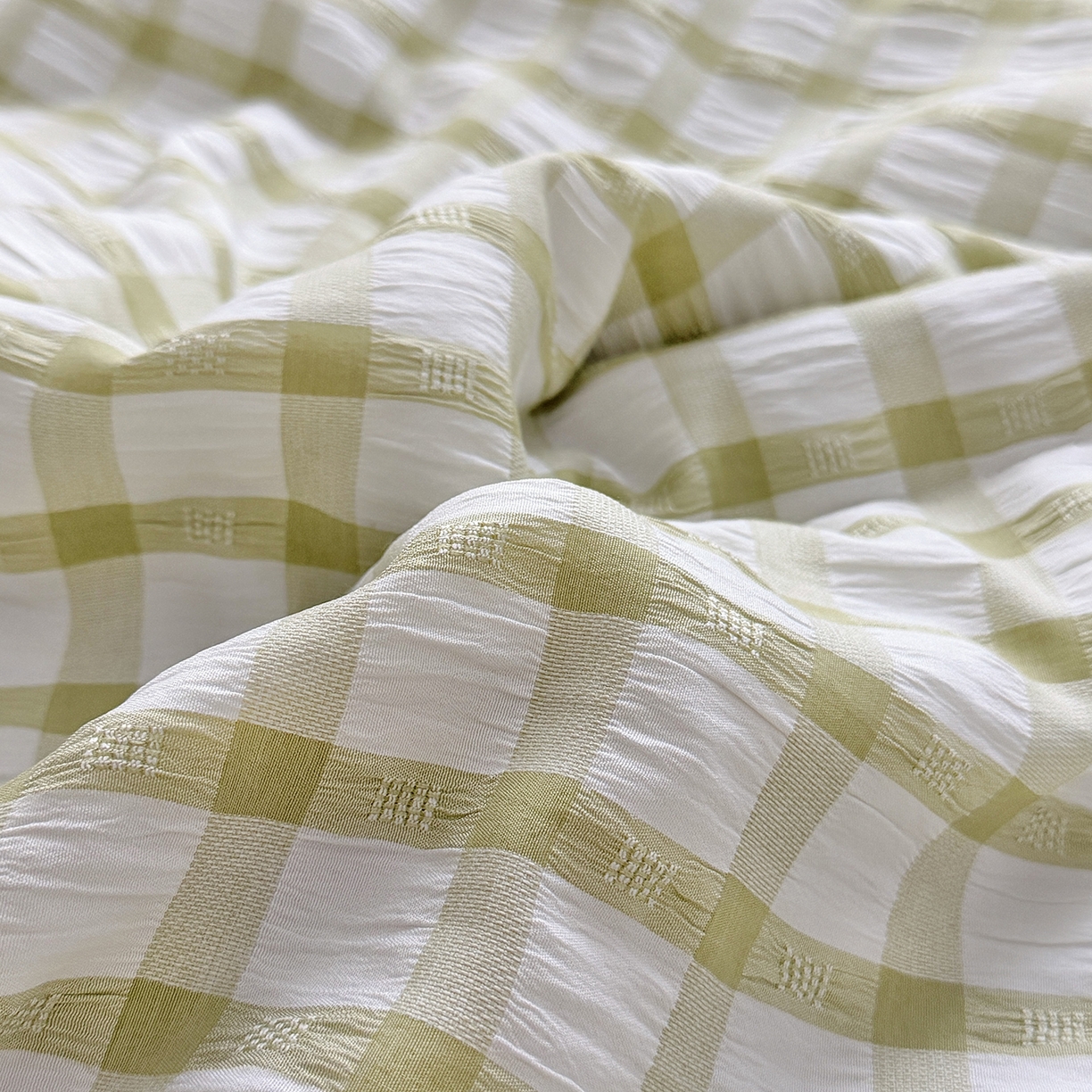 91家纺网 家纺一手货源 找家纺 乐卧家居 2026新款韩系千禧梦核多巴胺美学少女感格纹褶皱款荷叶边夏被空调被 千禧-复古绿