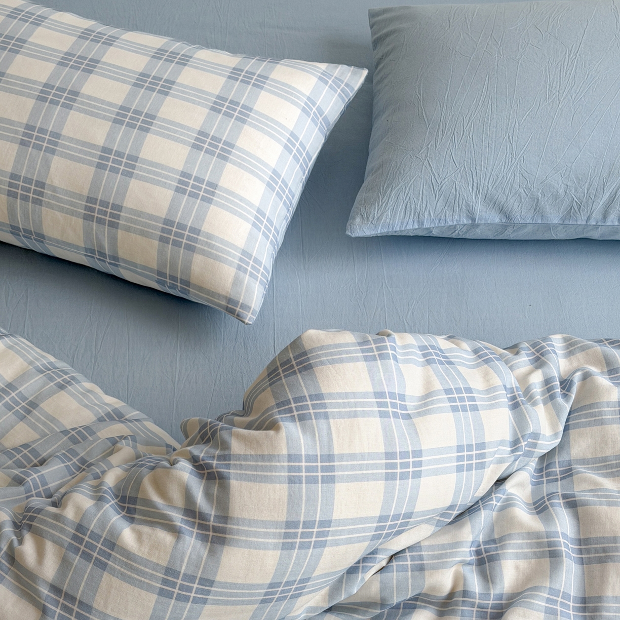 91家纺网 家纺一手货源 找家纺 玖弘家居 2026新款全棉双层纱格子四件套（默认格子枕套） 天空蓝