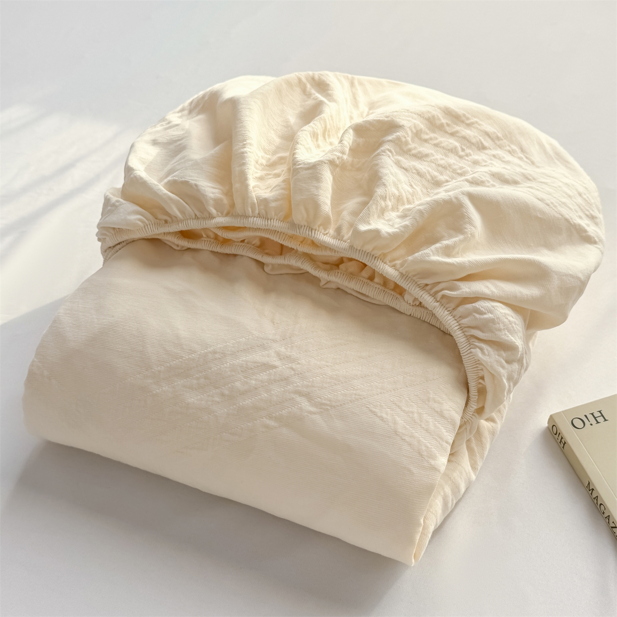 91家纺网 家纺一手货源 找家纺 女子家纺 2026新款全棉厚织三层水洗色织提花床笠 云汐-杏仁奶霜