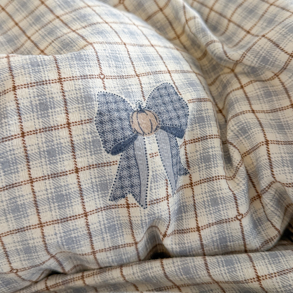 91家纺网 家纺一手货源 找家纺 金梦拉家纺 2026新款云感皱皱纱泡泡纱韩式床盖大花边四件套 蓝色蝴蝶结