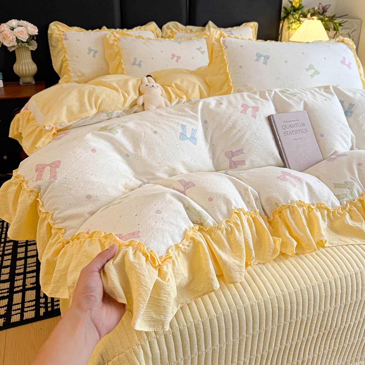 91家纺网 家纺一手货源 找家纺 金梦拉家纺 2026新款云感皱皱纱泡泡纱韩式床盖大花边四件套 柠檬蝴蝶结