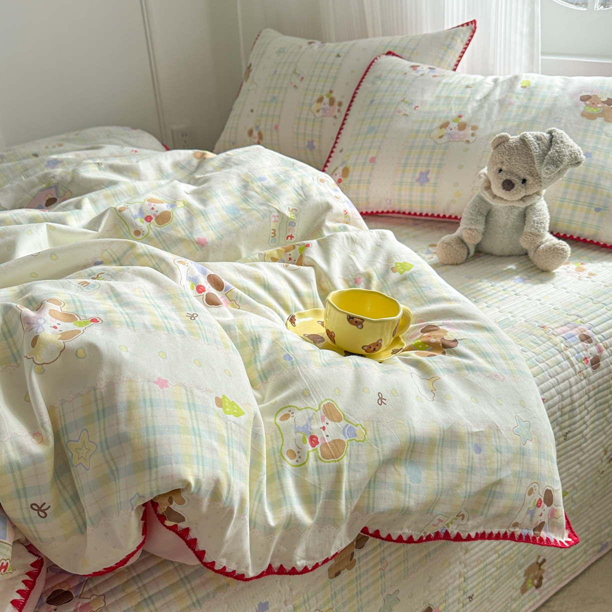 91家纺网 家纺一手货源 找家纺 KA家纺 2026春夏新款全棉纯棉床盖款卡通印花贝壳边四件套 格子小狗