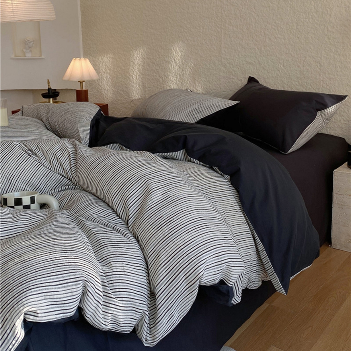 91家纺网 家纺一手货源 找家纺 琪格格纺织 2026新款纯棉纯棉色织肌理纹提花华夫格纯棉轻奢简约款四件套 A速写 提花黑条