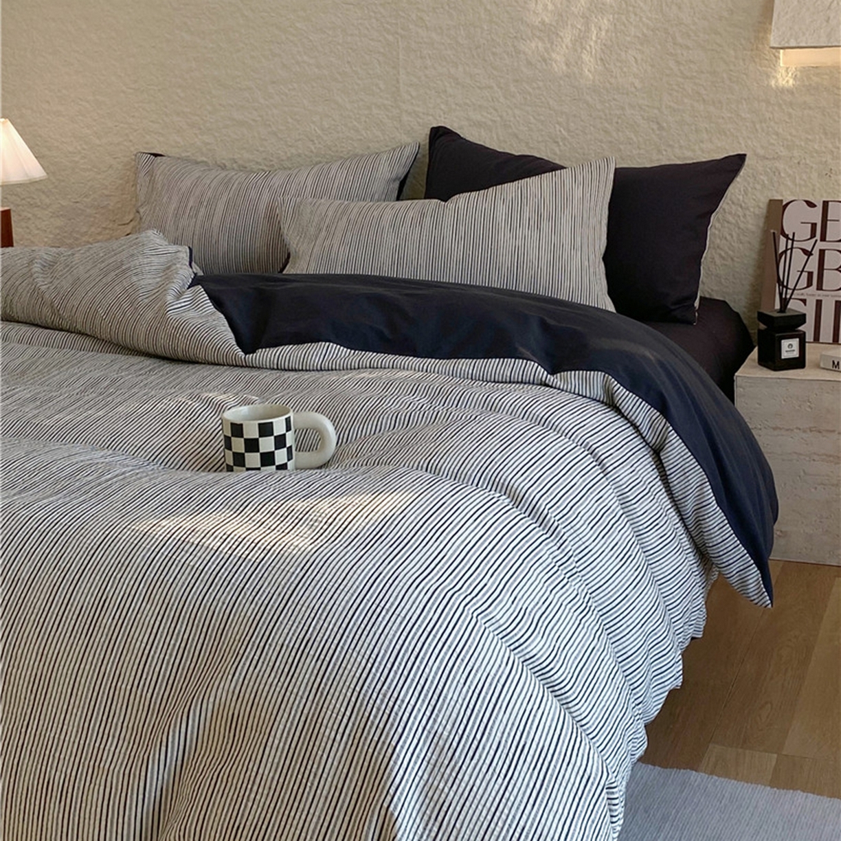 91家纺网 家纺一手货源 找家纺 琪格格纺织 2026新款纯棉纯棉色织肌理纹提花华夫格纯棉轻奢简约款四件套 A速写 提花黑条