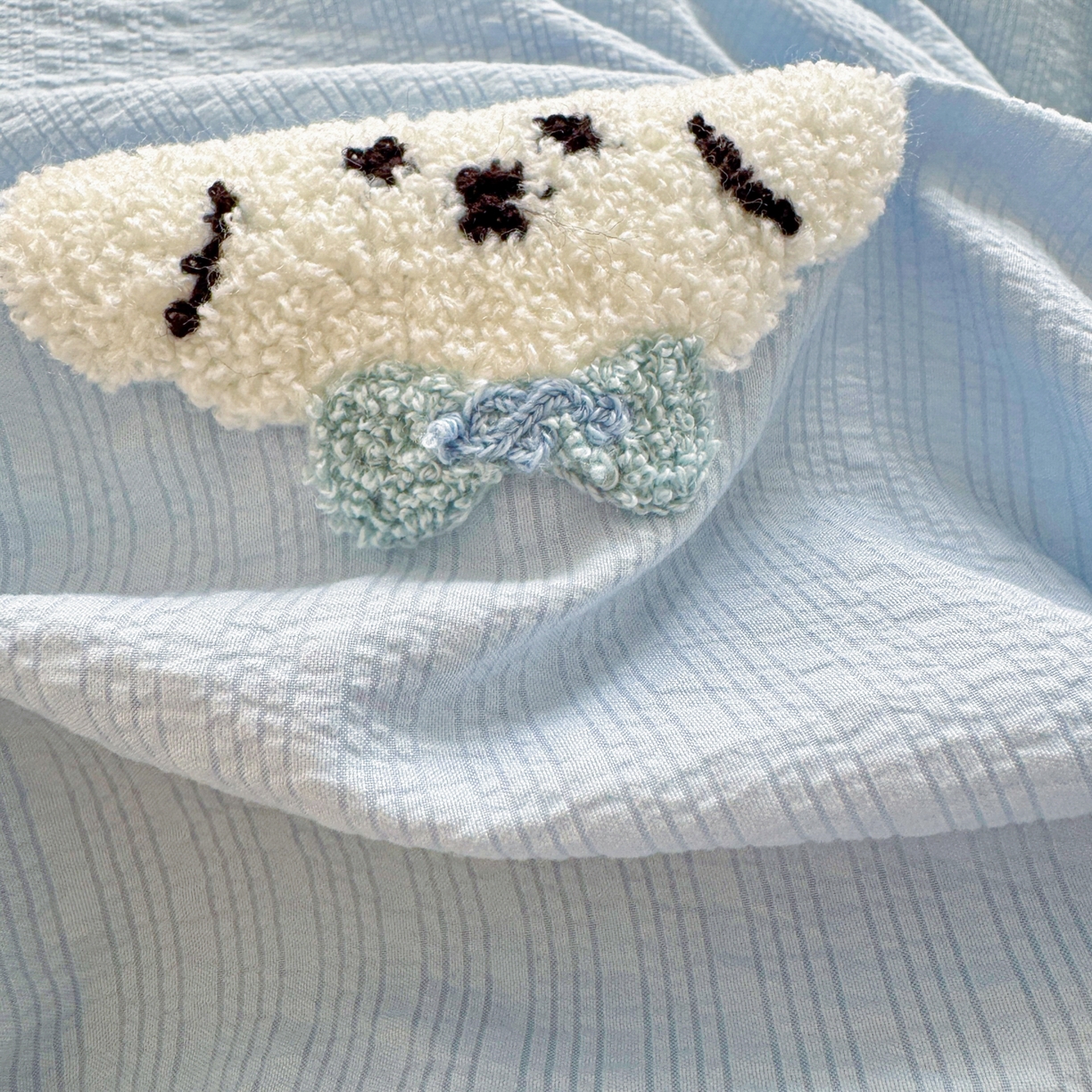 91家纺网 家纺一手货源 找家纺 橙意 2026新款高克重A类泡芙纱毛巾绣四件套 萌萌小狗-蓝