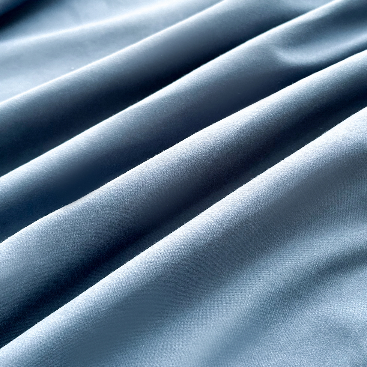 91家纺网 家纺一手货源 找家纺 佑泽家纺 2026年纯色双拼水洗棉四件套单被套 宾利蓝+卡其