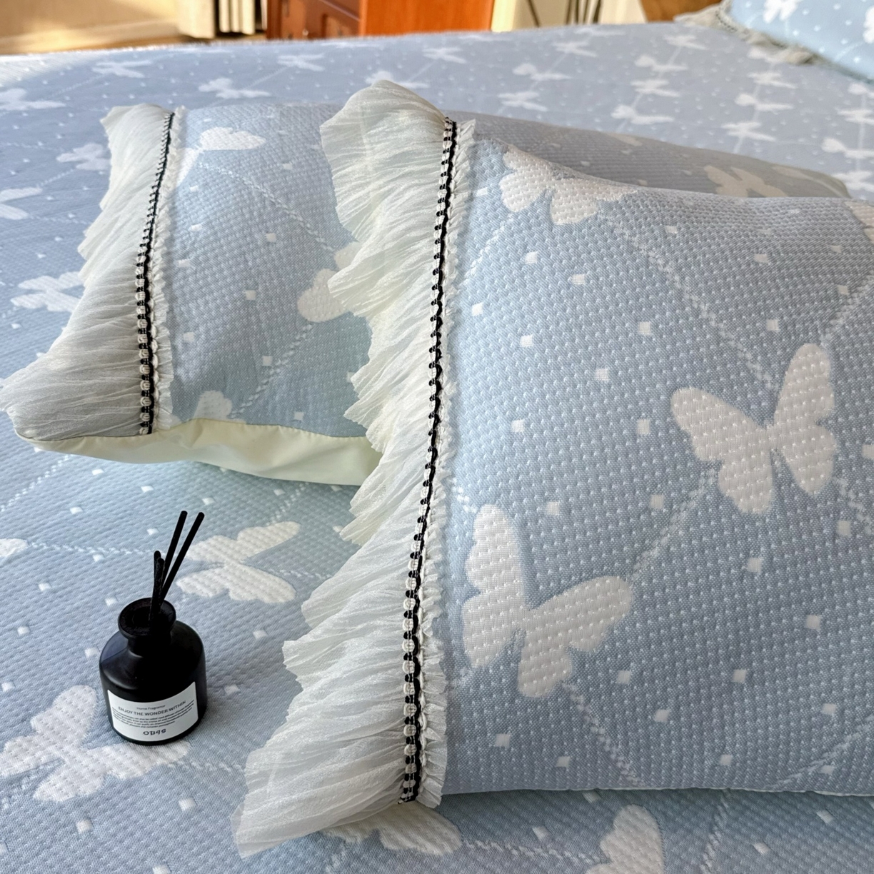 91家纺网 家纺一手货源 找家纺 兜米家居 2026春夏新款韩国冷感科技PE软凉席垫【床裙款】 床裙款-蝴蝶点点