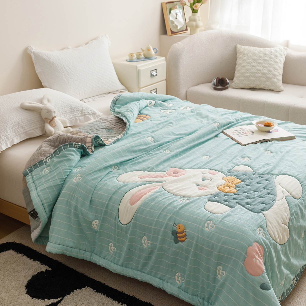 91家纺网 家纺一手货源 找家纺 朴尔家纺-毛巾被 2026新品纯棉云朵棉卡通独版十层加厚纱布泡芙被毛巾被 波波兔