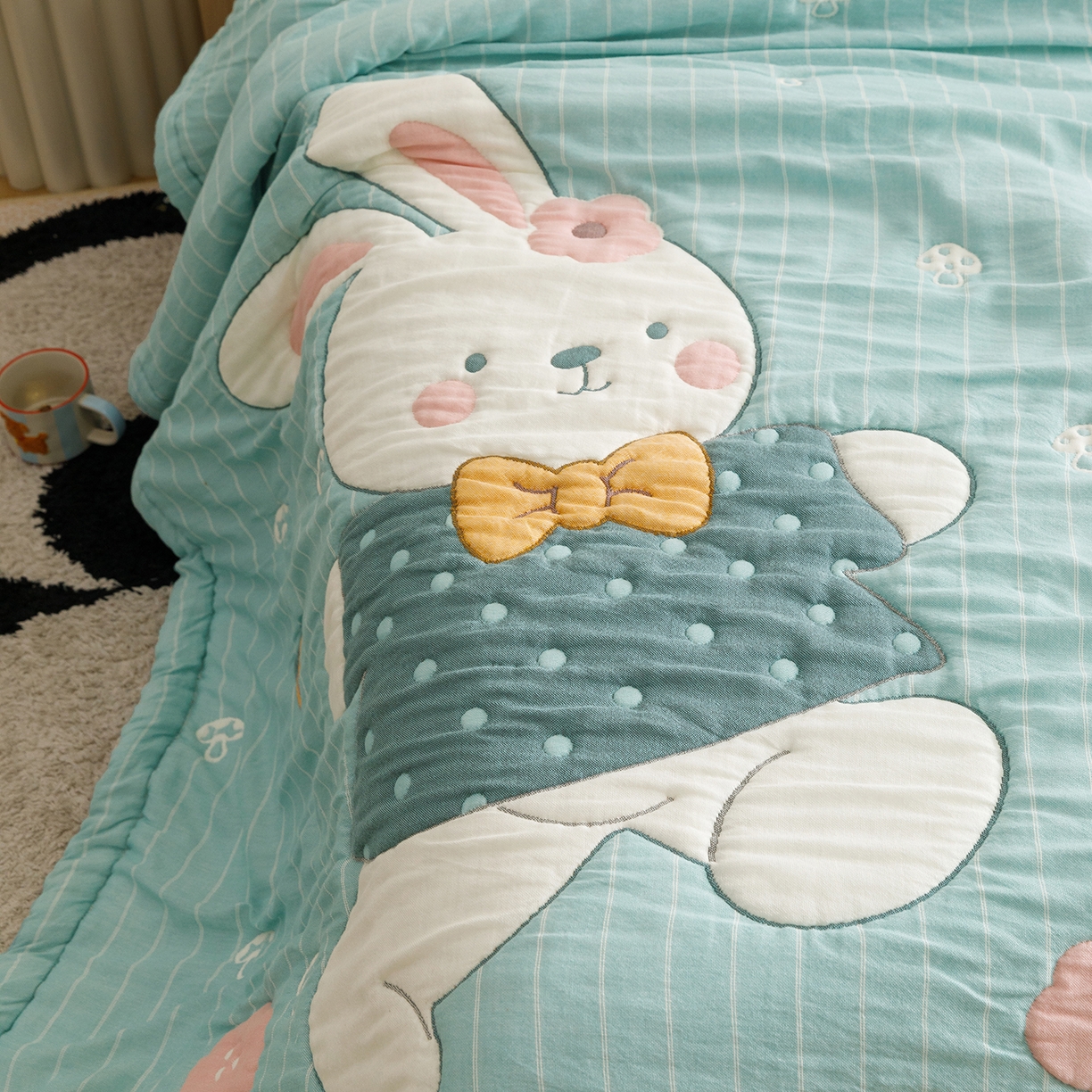 91家纺网 家纺一手货源 找家纺 朴尔家纺-毛巾被 2026新品纯棉云朵棉卡通独版十层加厚纱布泡芙被毛巾被 波波兔