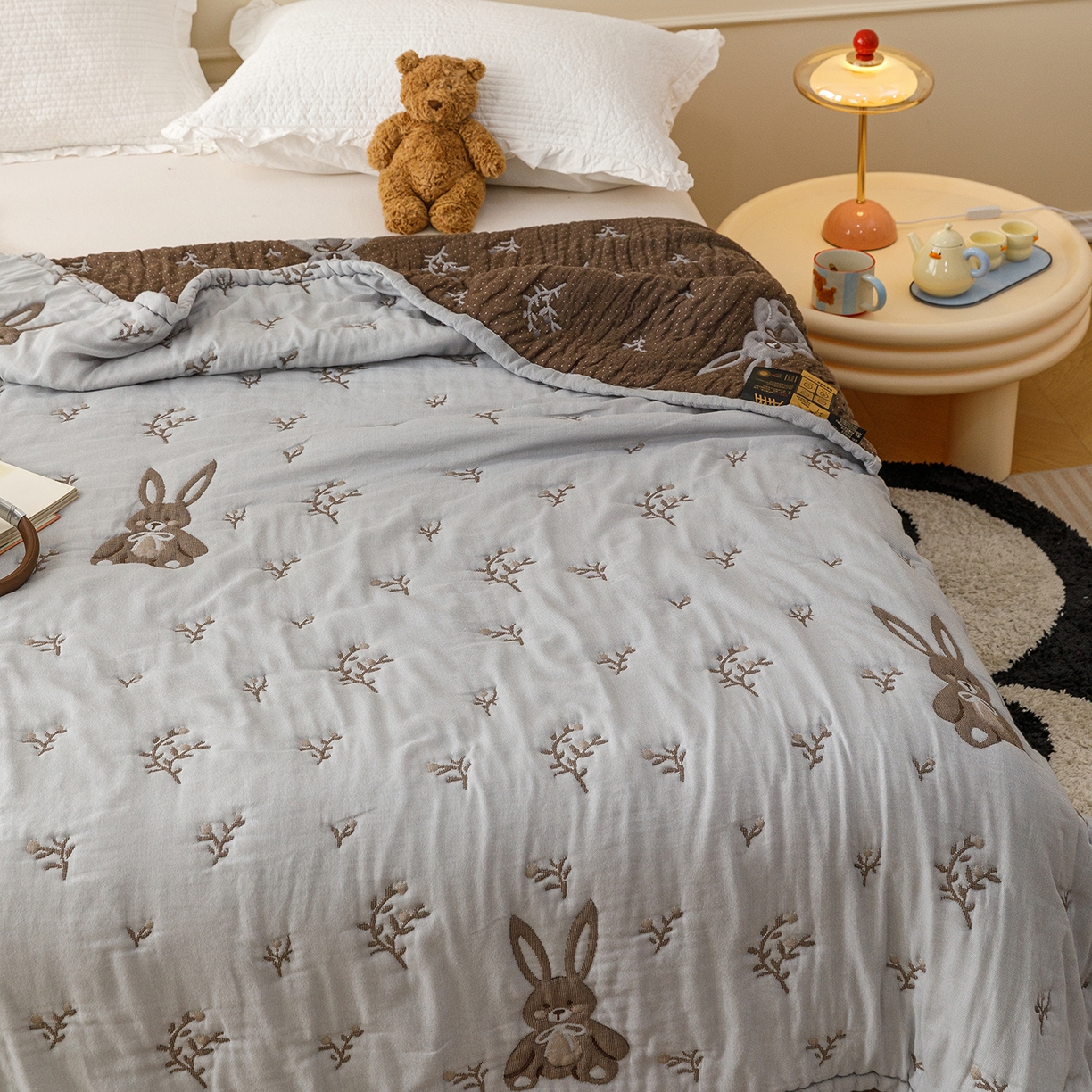 91家纺网 家纺一手货源 找家纺 朴尔家纺-毛巾被 2026新品十层轻肤纯棉云朵棉色织提花纱布泡芙被毛巾被 花枝兔