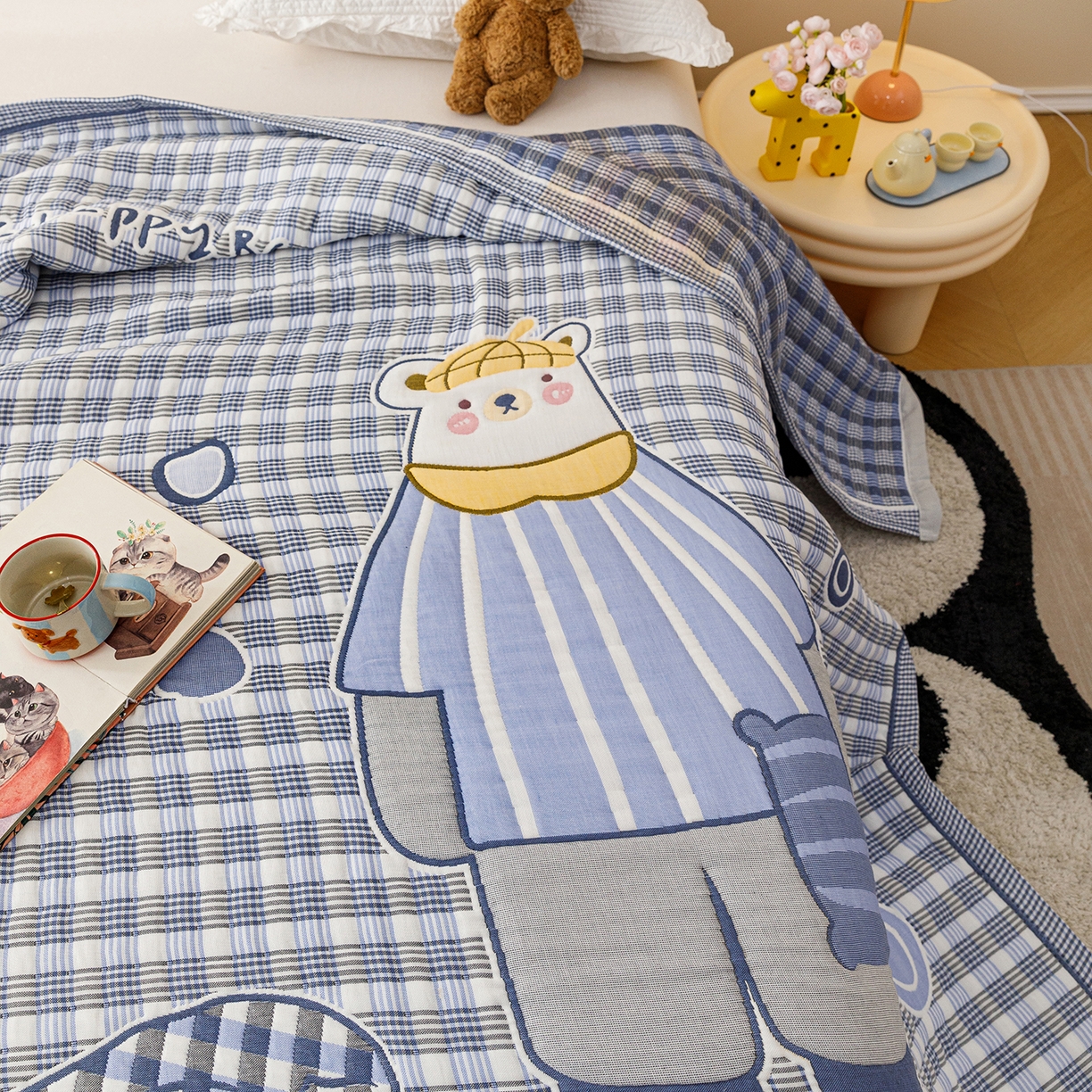 91家纺网 家纺一手货源 找家纺 朴尔家纺-毛巾被 2026新品十层轻肤纯棉云朵棉色织提花纱布泡芙被毛巾被 贝尔熊-蓝