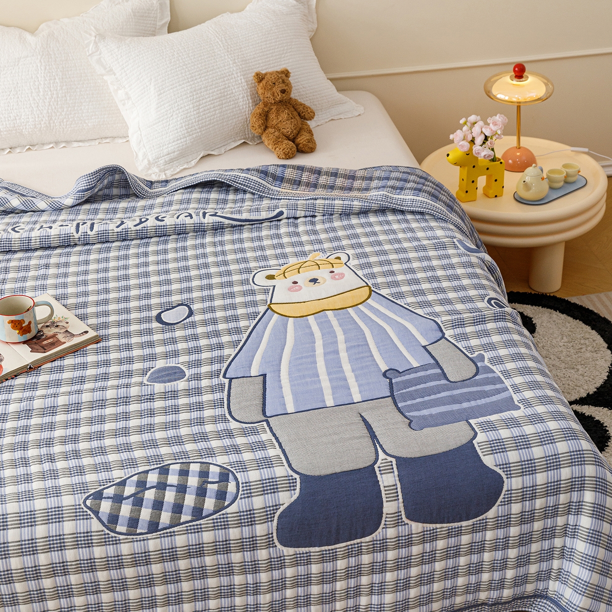 91家纺网 家纺一手货源 找家纺 朴尔家纺-毛巾被 2026新品十层轻肤纯棉云朵棉色织提花纱布泡芙被毛巾被 贝尔熊-蓝