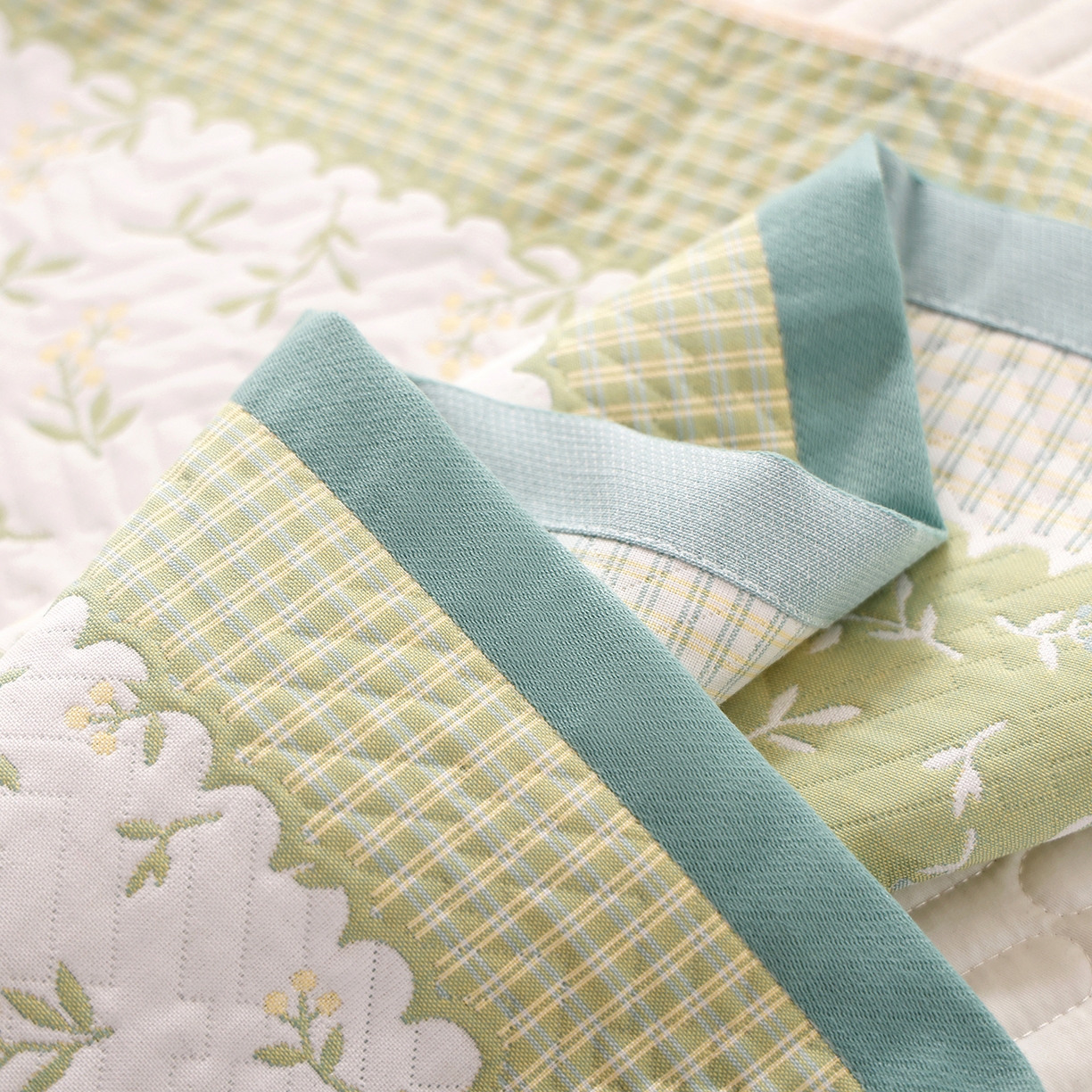 91家纺网 家纺一手货源 找家纺 朴尔家纺-毛巾被 2026新品小清新纯棉色织高密多层纱布枕巾 花韵南瓜-绿