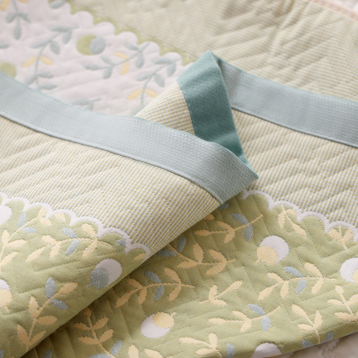 91家纺网 家纺一手货源 找家纺 朴尔家纺-毛巾被 2026新品小清新纯棉色织高密多层纱布枕巾 恋恋榛果-绿