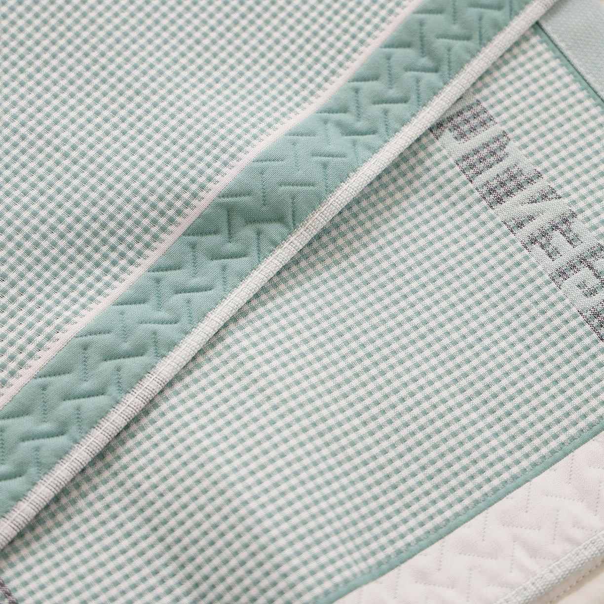 91家纺网 家纺一手货源 找家纺 朴尔家纺-毛巾被 2026新品小清新纯棉色织高密多层纱布枕巾 千鸟长耳兔-绿