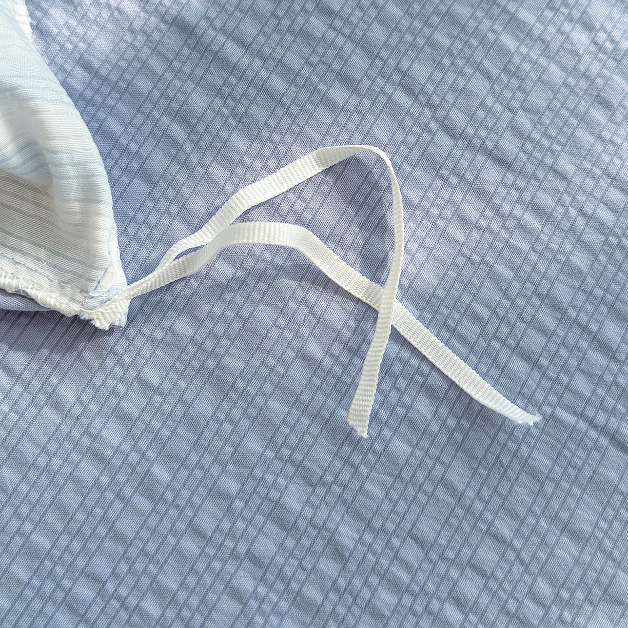 91家纺网 家纺一手货源 找家纺 竹合家纺 2026春夏新品高克重A类泡芙纱泡泡皱皱纱四件套 条纹腊肠狗