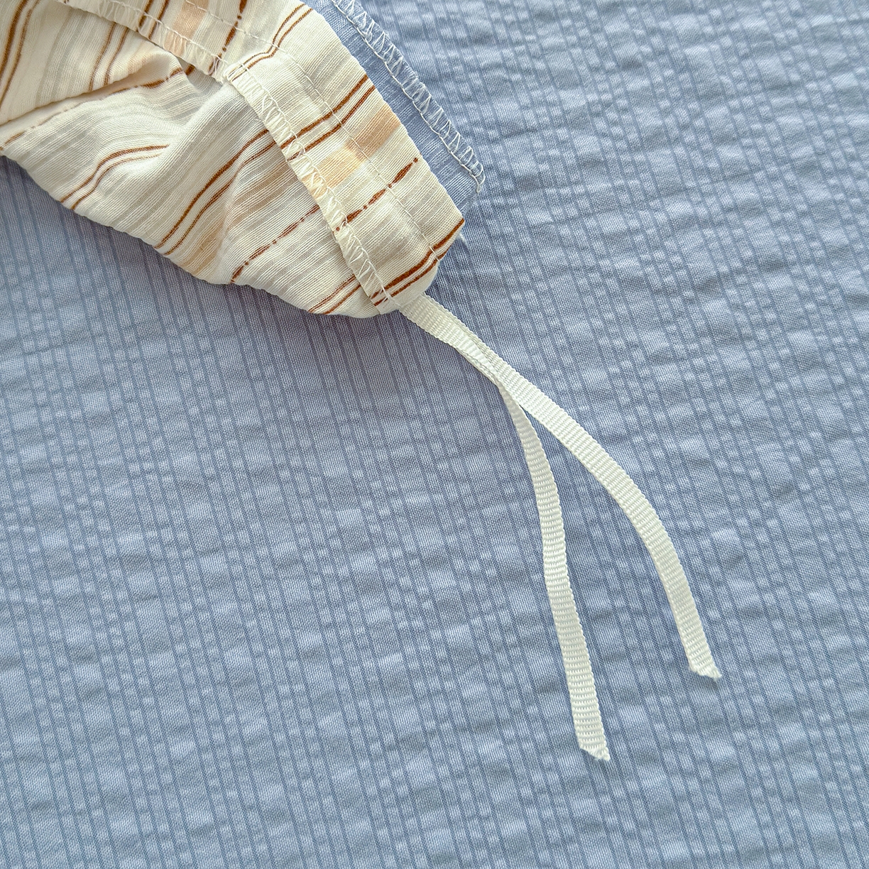 91家纺网 家纺一手货源 找家纺 竹合家纺 2026春夏新品高克重A类泡芙纱泡泡皱皱纱四件套 熊先生